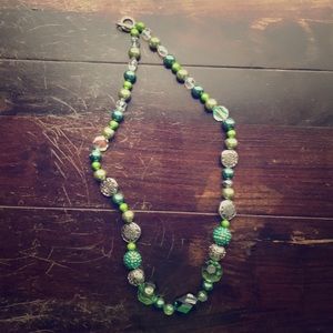 Turquoise themed necklace with a pair of earrings